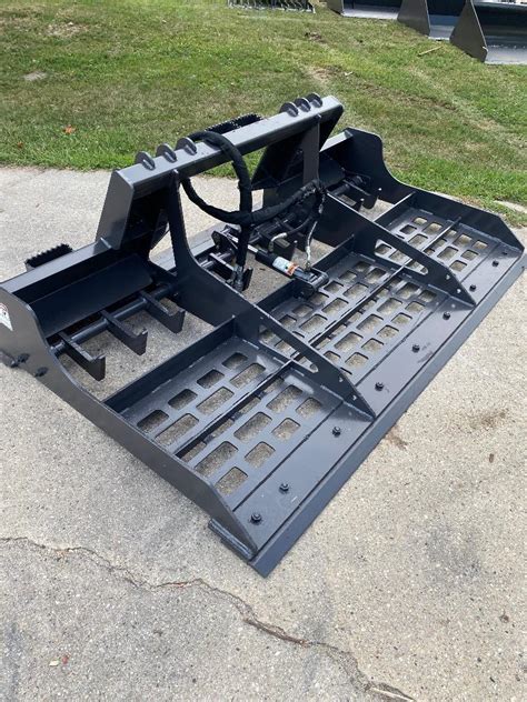 ground leveling attachment for skid steer|skid steer gps leveling attachment.